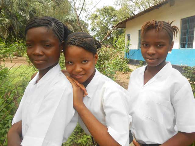 Three kids in Sierra Leone