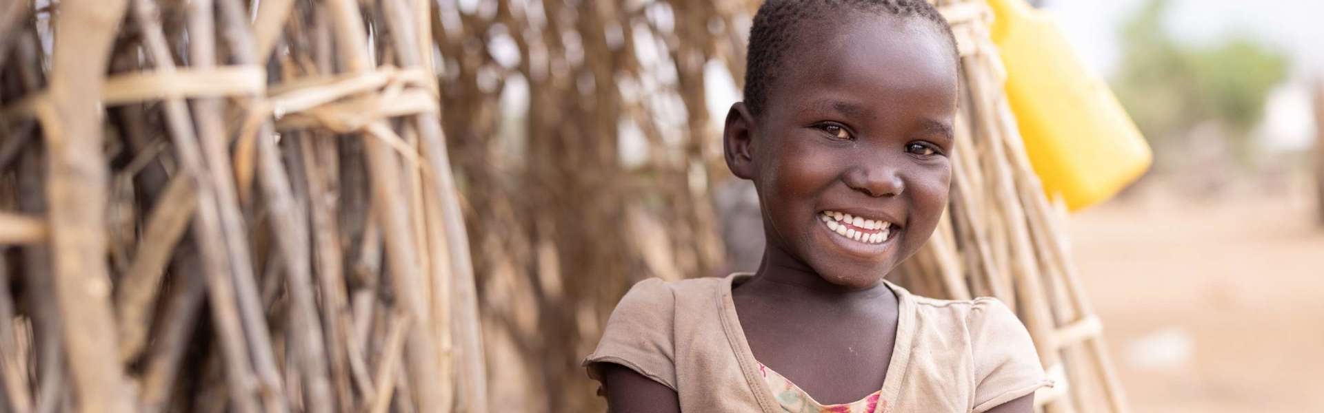 Blessing (4) enjoys sweet potatoes each day from her Uncle Vincent's farm.