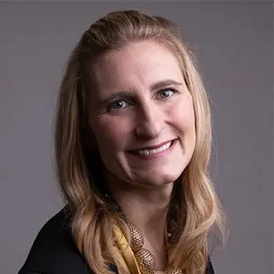 Professional headshot featuring Erin Kennedy
