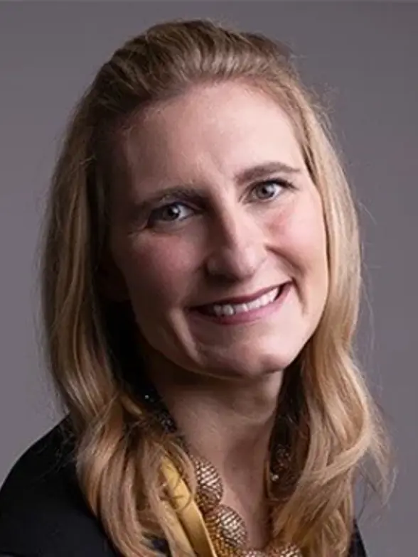 Professional headshot featuring Erin Kennedy