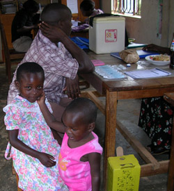 Image of a man answering questions for an awareness program on child nutrition
