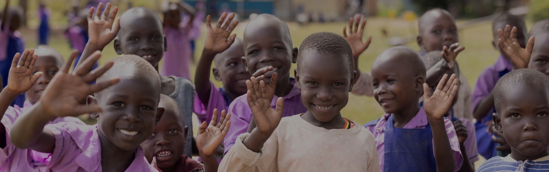 Happy children stand together at a ChildFund-supported early childhood development center in Katakwi District, Uganda ChildFund.