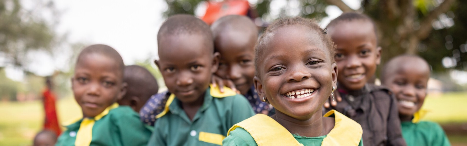 smiling girl with friends at school
