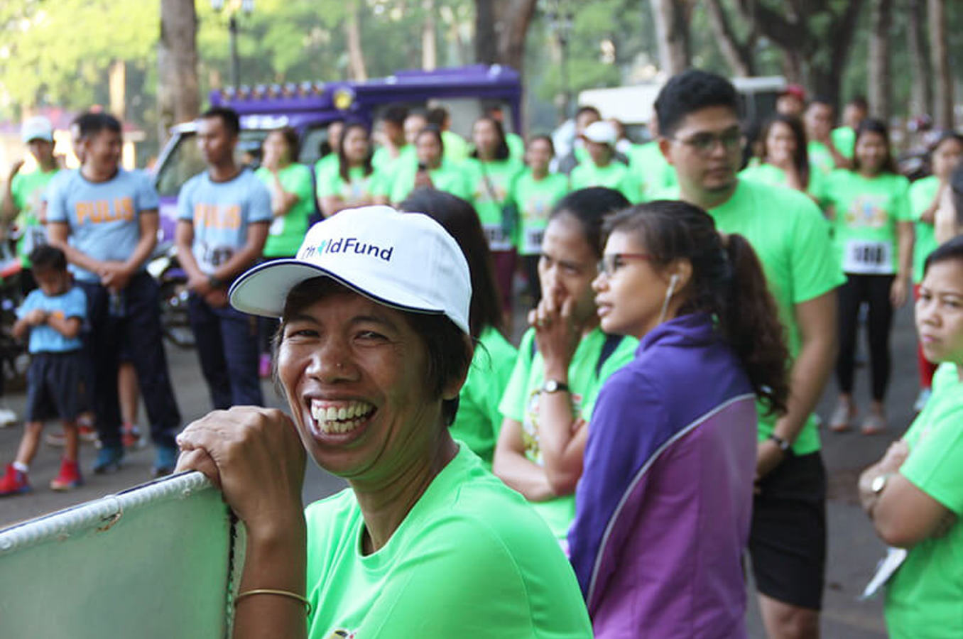 ChildFund staff and youth participate in a community run against child labor in Bukidnon Province, Philippines.