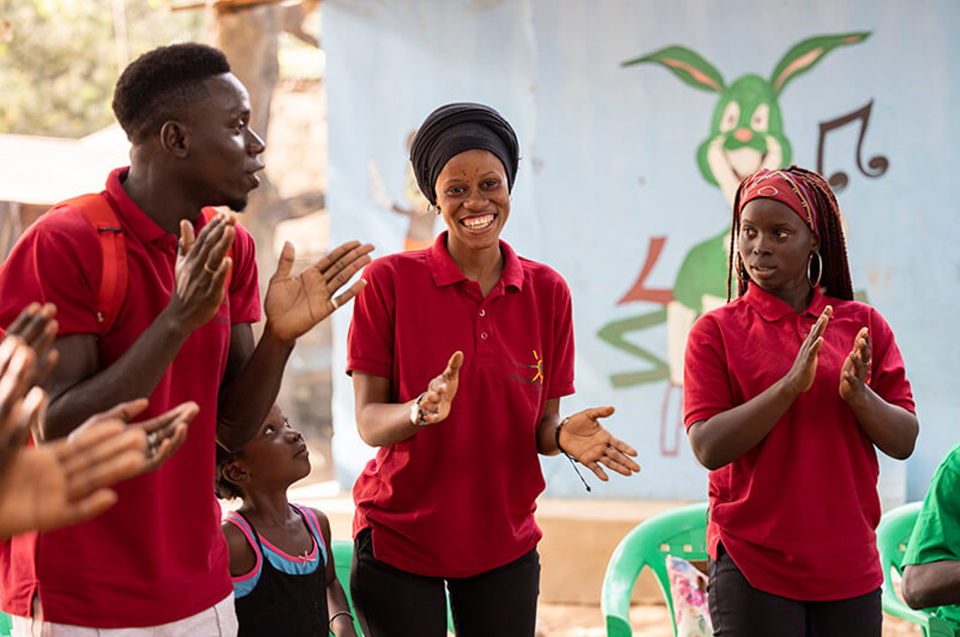 Youth in their early 20s participate in a ChildFund youth club meeting in Ziguinchor, Senegal, where they learn leadership skills and discuss community issues.