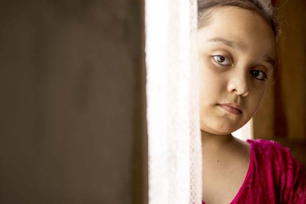 Yeimi, 10, lives in a community rocked by violence in Santa Barbara Department, Honduras.